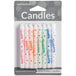 A pack of Creative Converting birthday candles with colorful spiral designs and "Happy Birthday" writing on them.