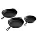 A group of three Lodge cast iron skillets with handles.