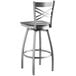A silver bar stool with a black wood seat and a backrest.
