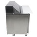 A stainless steel Traulsen refrigerated sandwich prep table with white surfaces.