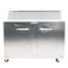 A large stainless steel Traulsen refrigerator with one left hinged and one right hinged door.