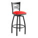 A black bar stool with a red vinyl cushion.