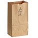 A Duro brown paper bag with a logo and "3 lb." on it.