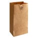 A close up of a brown Duro Bulwark paper bag with a black logo.