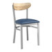 A Lancaster Table & Seating Boomerang chair with a navy vinyl seat and driftwood back.