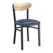 A Lancaster Table & Seating Boomerang Series chair with navy vinyl seat and driftwood back.