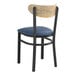 A Lancaster Table & Seating Boomerang Series chair with navy seat and driftwood back on a black frame.
