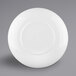 A white Elite Global Solutions melamine coupe bowl with a white rim.