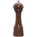 A Chef Specialties Windsor Walnut pepper mill with a wooden handle.