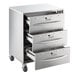 A stainless steel ServIt freestanding triple drawer warmer.