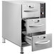 A stainless steel ServIt narrow freestanding drawer warmer with three drawers.