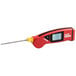 A red and black Cooper-Atkins digital thermometer with a yellow DuraNeedle probe handle.