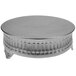 A Tabletop Classics by Walco nickel-plated round cake stand with a decorative design on the surface.