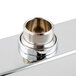 A chrome plated metal T&S deck mounted faucet base with a hole.