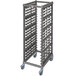 A grey metal Cambro sheet pan rack with plastic casters.