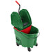 A green Rubbermaid mop bucket with a red handle.