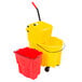 A yellow Rubbermaid mop bucket with a red dirty water bucket attached.