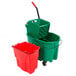 A green Rubbermaid WaveBrake mop bucket and red dirty water bucket with a mop.
