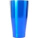 A blue container with a silver rim.