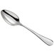 An Arcoroc Matiz stainless steel demitasse spoon with a silver handle and spoon.