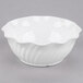 A white Cambro Camwear swirl bowl.