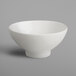 A RAK Porcelain ivory porcelain bowl lid on a gray surface.