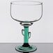 A green Libbey cactus margarita glass with a stem.