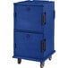 A navy blue Cambro Ultra Camcart for 24 food pans on heavy-duty casters.