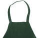A Chef Revival hunter green apron with straps.
