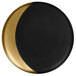 A close-up of a RAK Porcelain Metal Fusion gold and black deep plate with a moon shape in the middle.