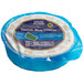 A blue round container with a white label that says "St. Clemens Green Island PGI Danish Crumbly Blue Cheese"