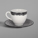 A RAK Porcelain beech grey coffee cup and saucer with white and black accents.