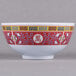 A close-up of a white melamine rice bowl with a red and white Chinese design.