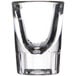 A close up of a clear Libbey fluted shot glass.