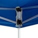 A blue Backyard Pro Courtyard Series instant canopy with metal poles.