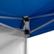 A blue Backyard Pro canopy with metal supports.
