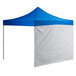 A blue tent with a white background and tarp.