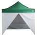 A green and white tent with a triangular top and white walls.