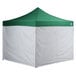 A white and green tent with white walls.
