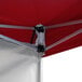 A close up of the red aluminum corner of a Backyard Pro Courtyard Series canopy.