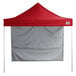 A red canopy tent with a white cover.