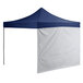 A white and blue tent with a blue and white fabric top.