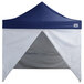 A blue and white tent with a triangular top.