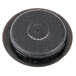 A white round plug with a black button on top.