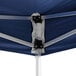 A navy blue Backyard Pro canopy with white fabric and metal poles.