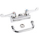 A chrome Equip by T&amp;S wall mount swivel faucet with wrist action handles.