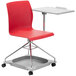A red National Public Seating mobile tablet chair on a grey school desk.