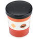 A Choice orange and black paper soup cup with a vented paper lid.