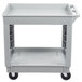 A gray plastic Continental utility cart with two shelves and wheels.