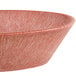 A white oval basket with a red rim.